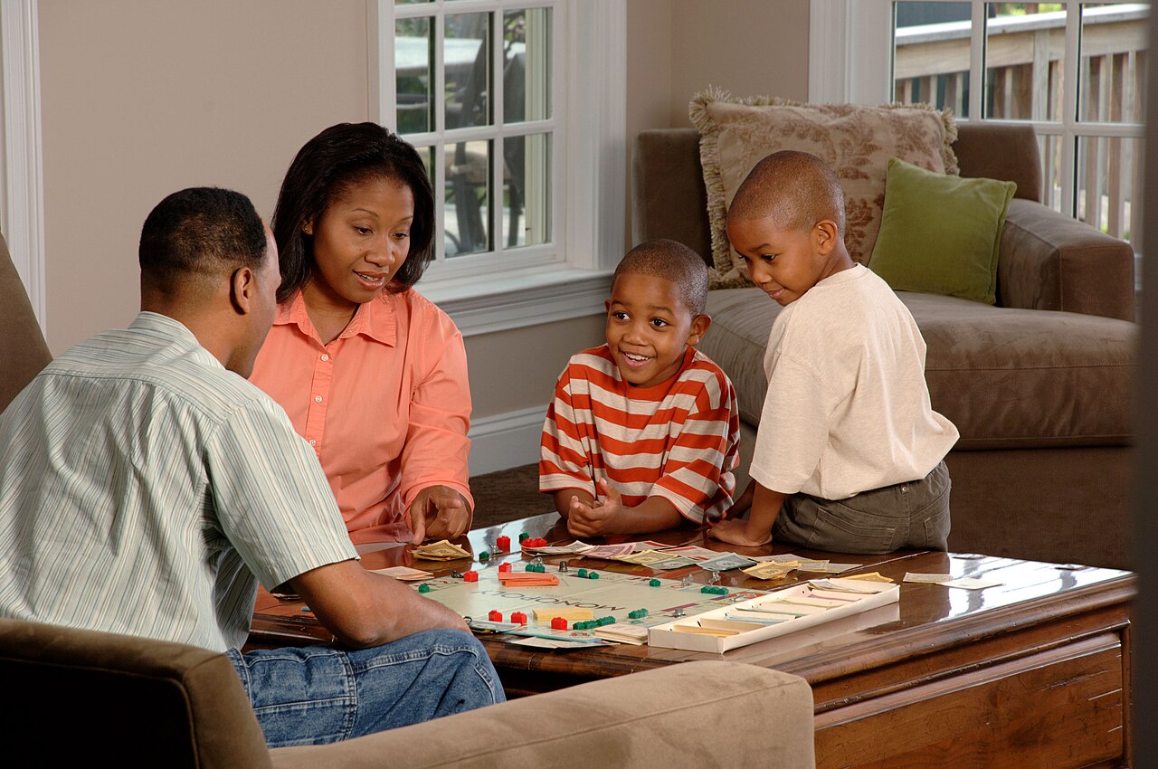 Colleagues playing a board game