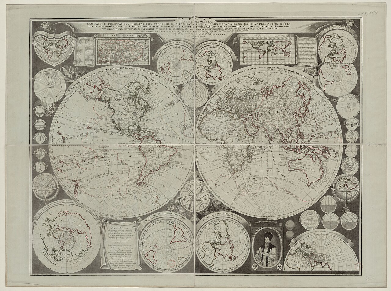 Un globe et un atlas posés sur une table